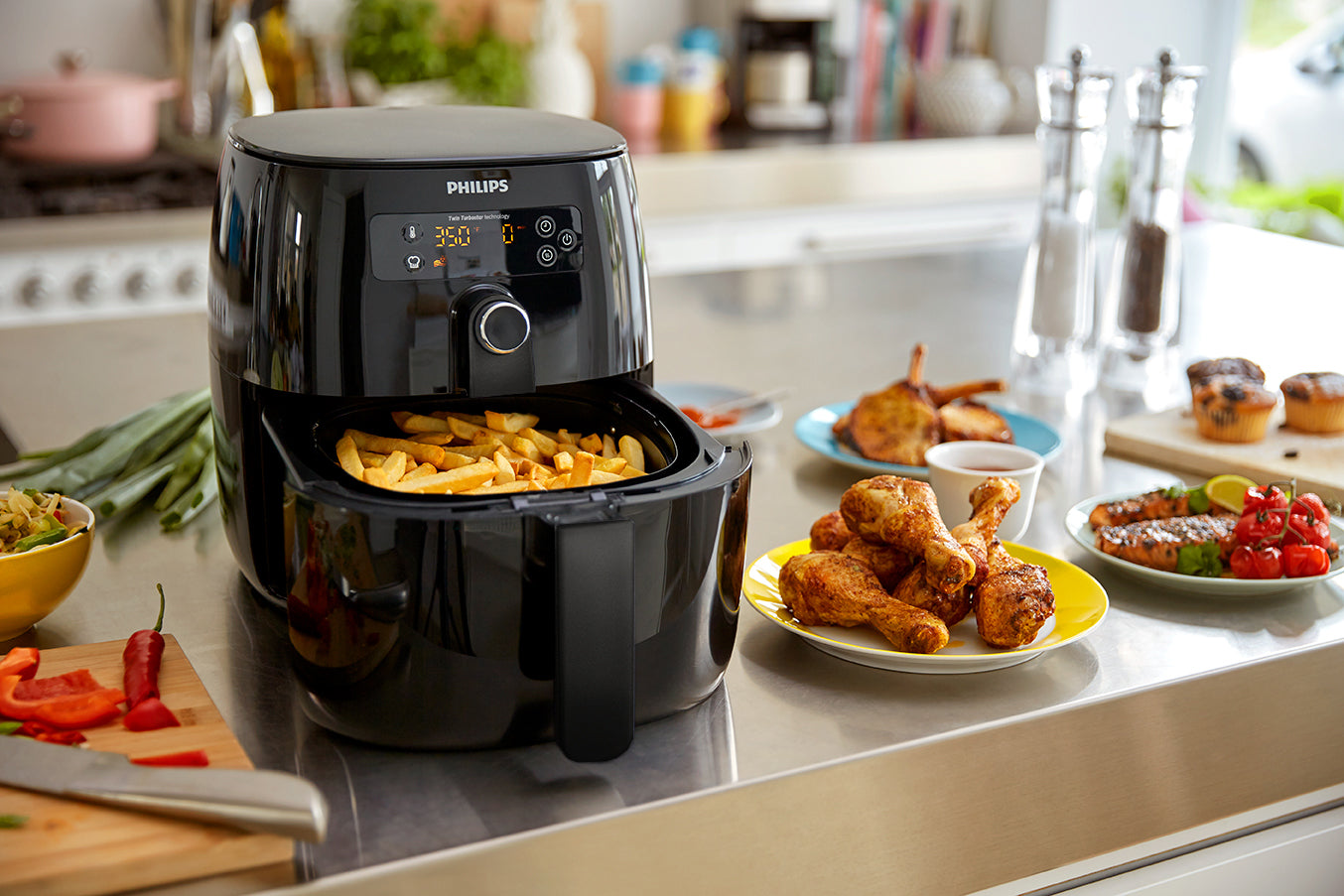 Philips Airfryer cooking fries and show casing other food.