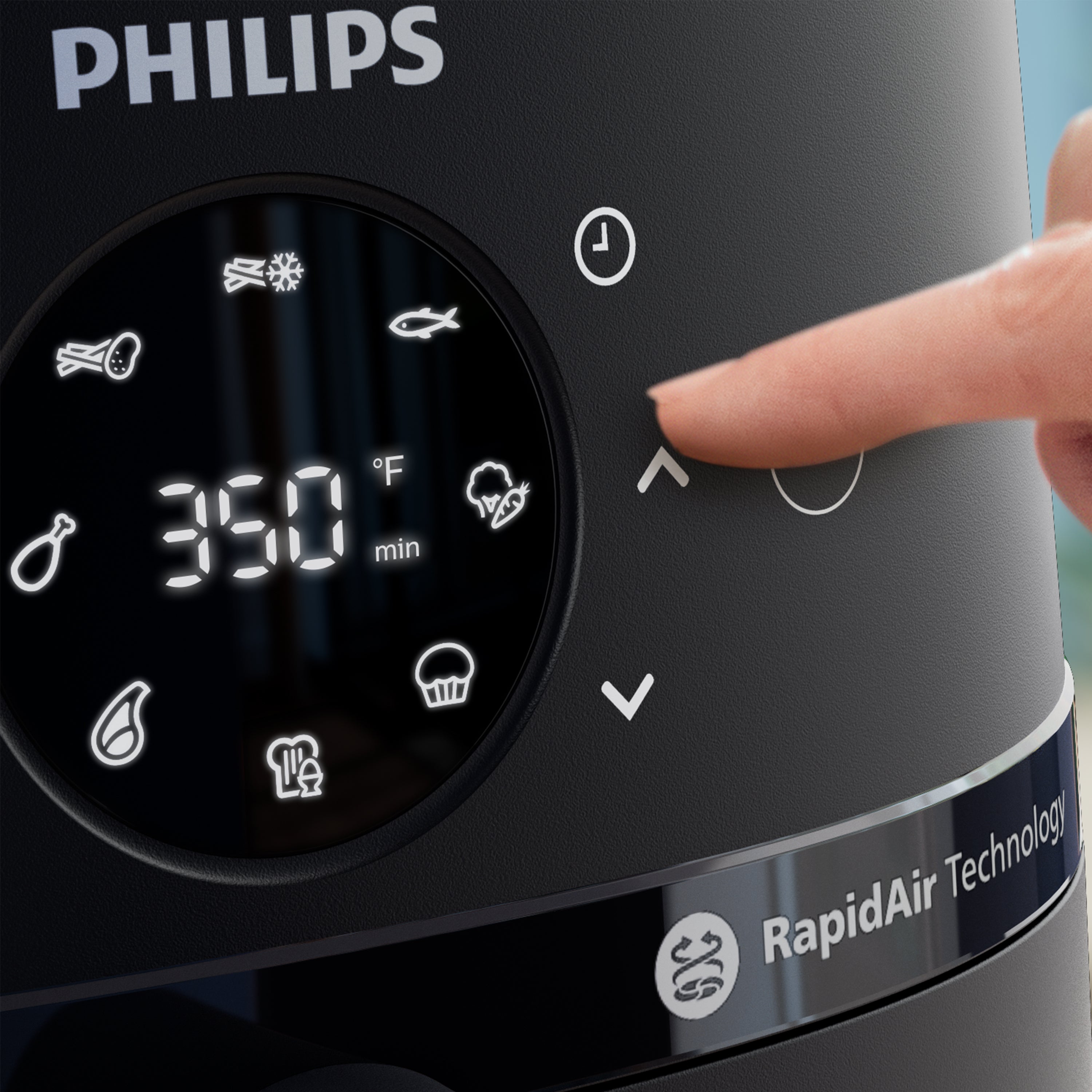 Philips kitchen appliance with digital display and RapidAir Technology branding.