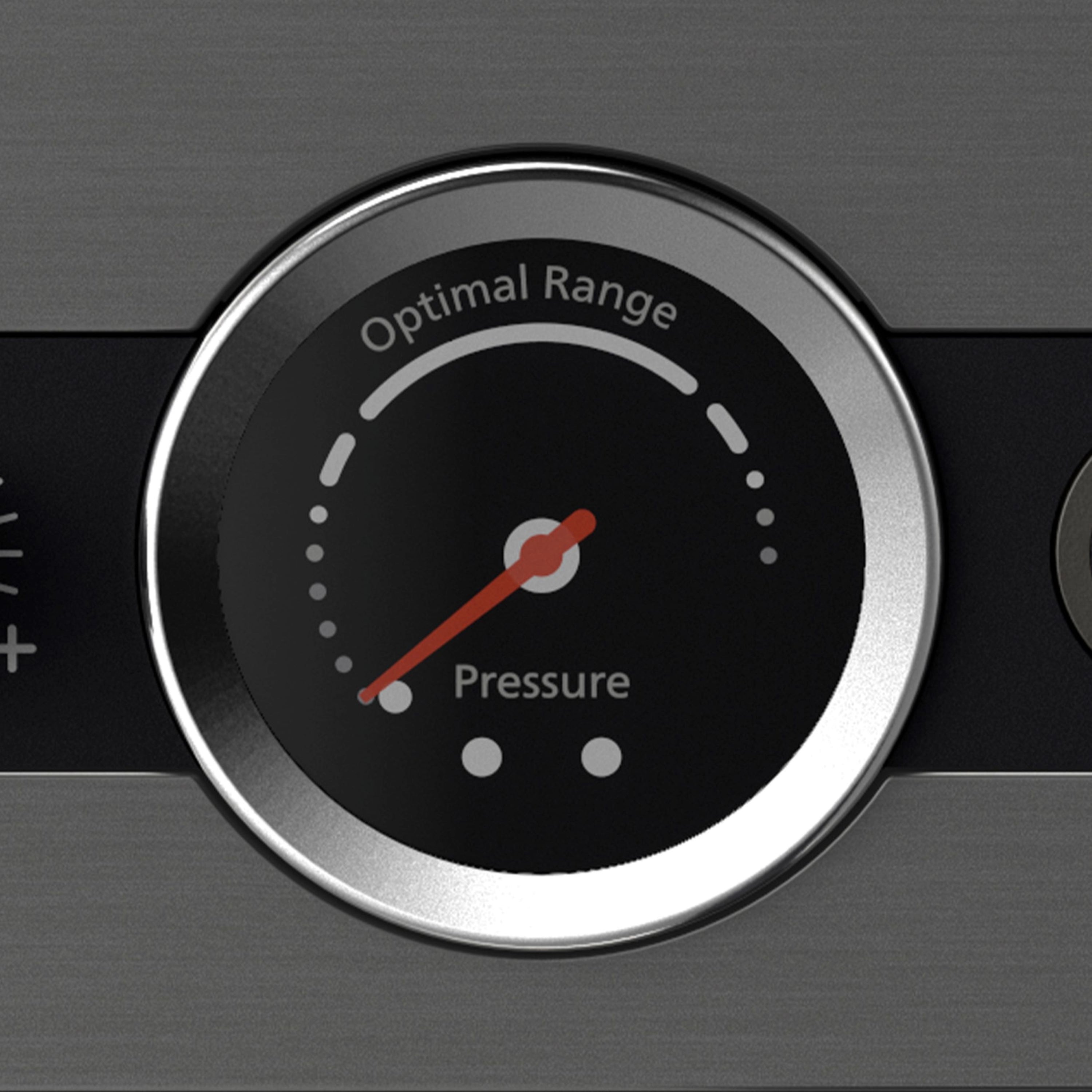 Close-up of a pressure gauge on a Philips coffee machine, showing the optimal pressure range.