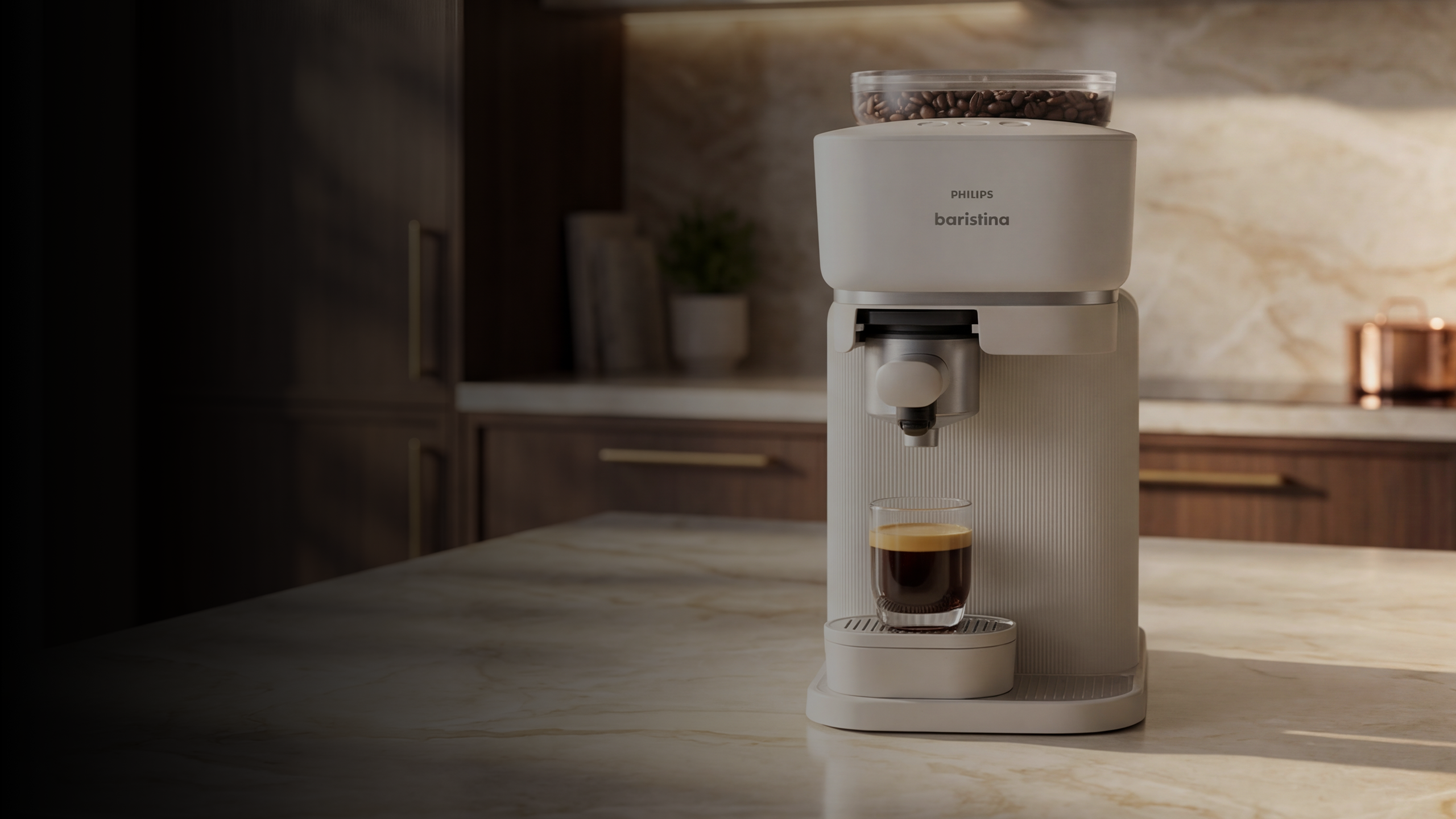 Coffee machine with a cup of coffee on a kitchen counter