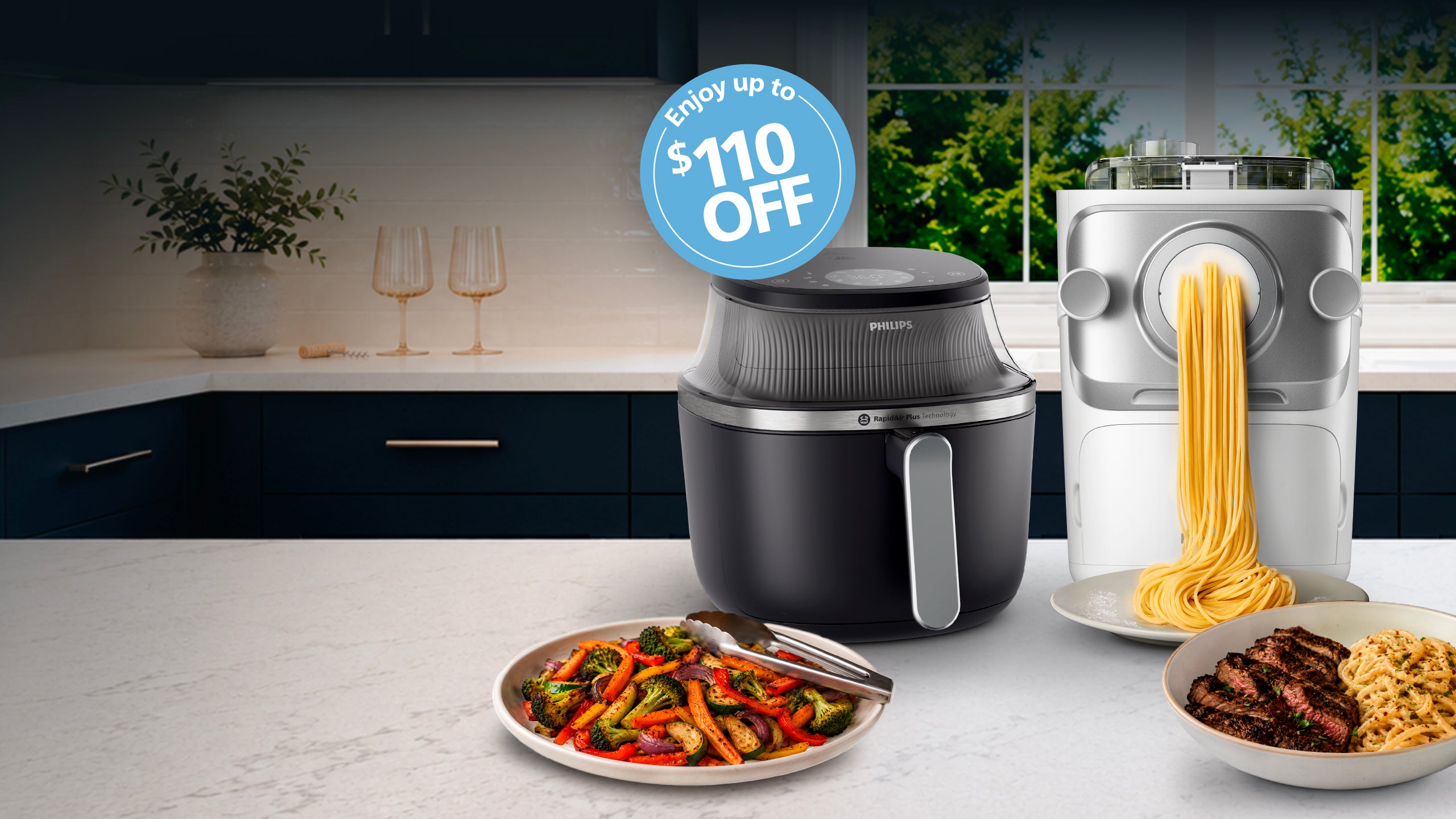 Kitchen scene with a black air fryer, pasta maker, and food on a counter with a promotional offer.