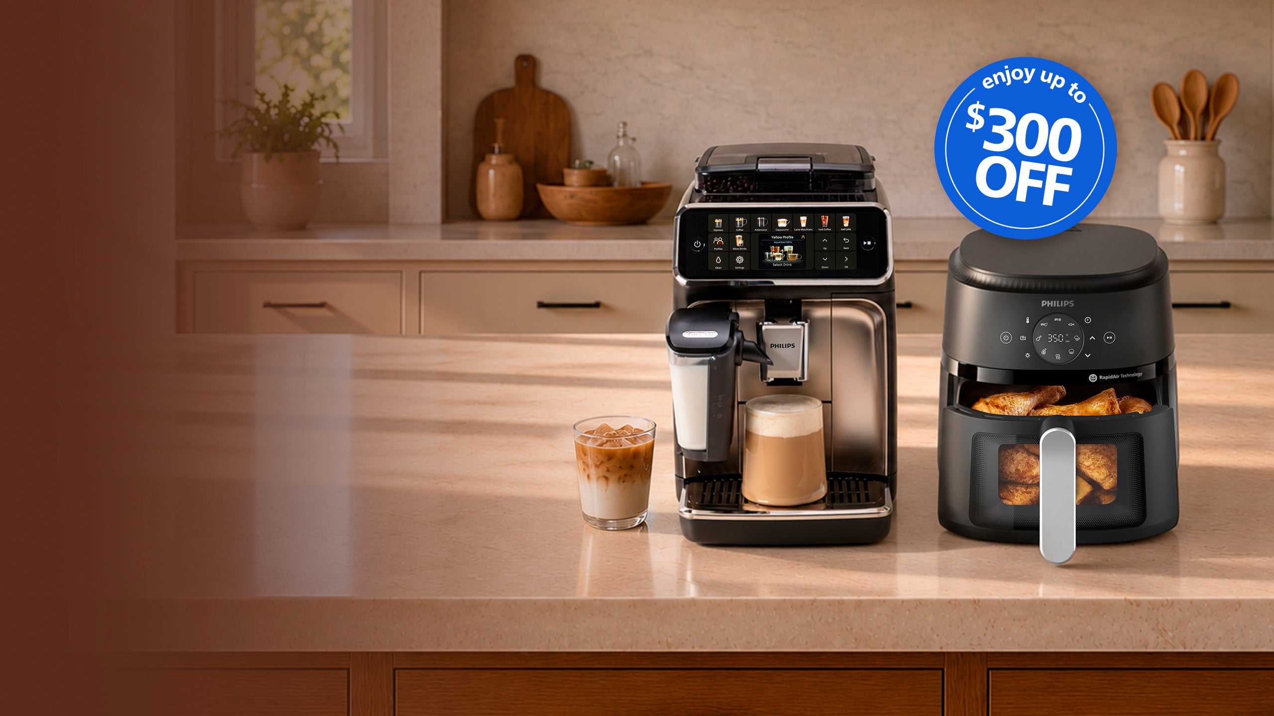Philipe Fully Automatic Espresso Machine and Airfyer sitting on the counter with a kitchen background.