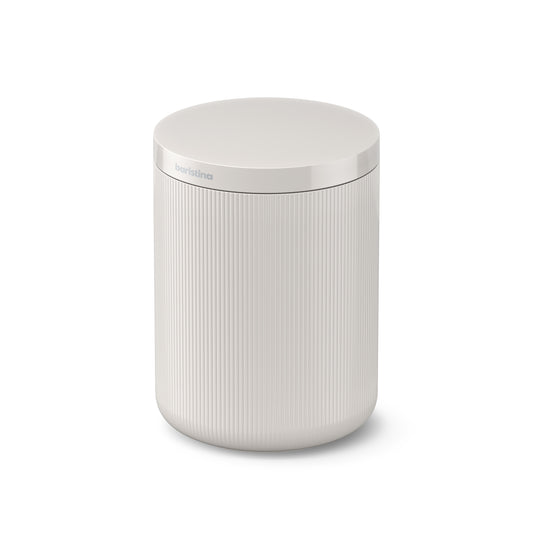 White cylindrical container with lid on a white background