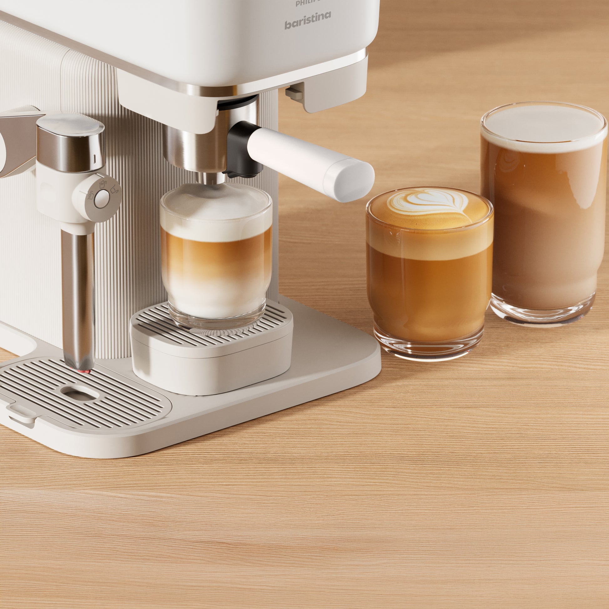 Espresso machine with two glasses of coffee on a wooden surface