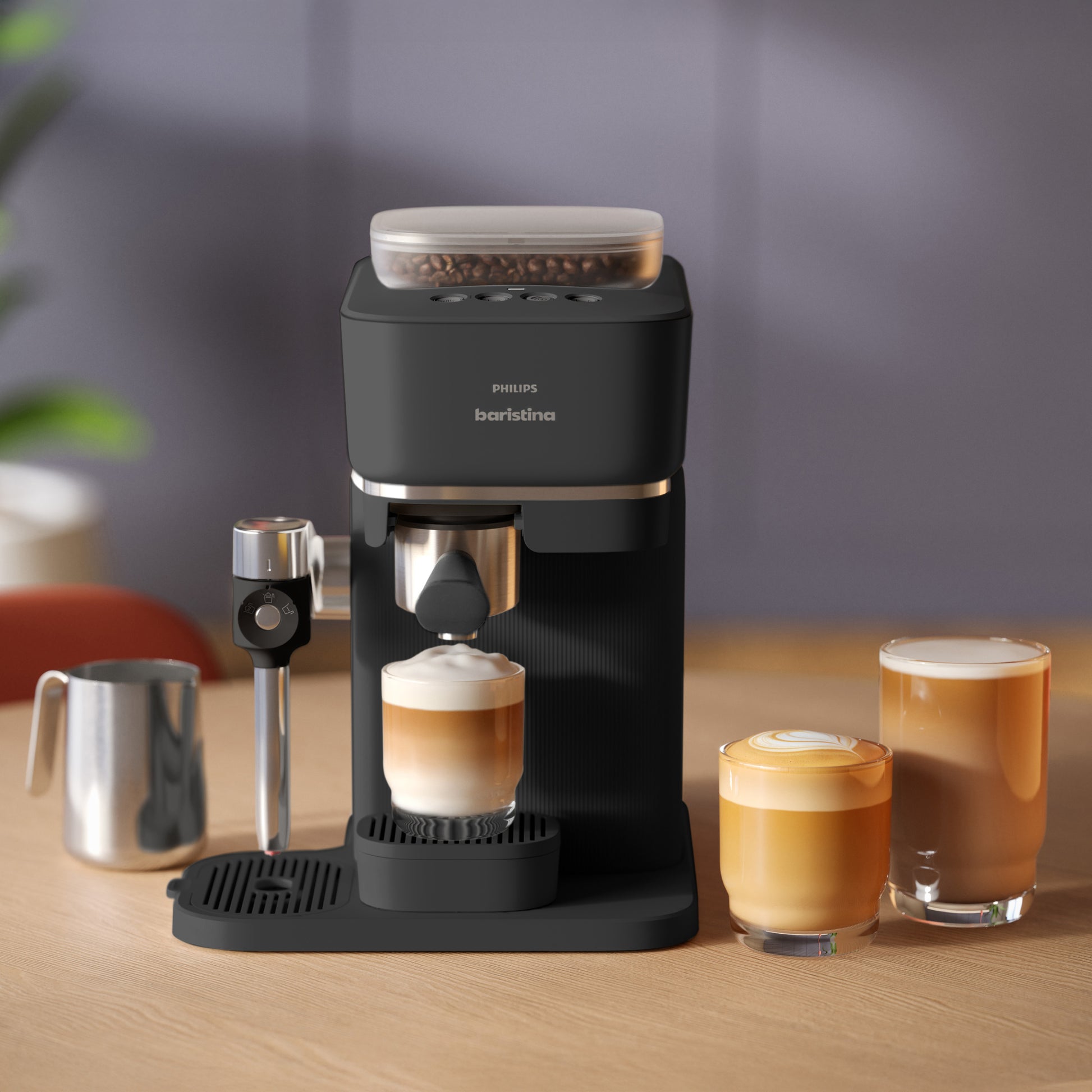 Baristina Latte machine with three glasses of coffee on a wooden table