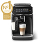 Philips coffee machine with a glass of latte on a white background