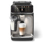 Philips 5500 coffee machine with a glass of layered coffee and milk on a white background