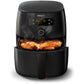 Philips air fryer with chicken inside on a white background