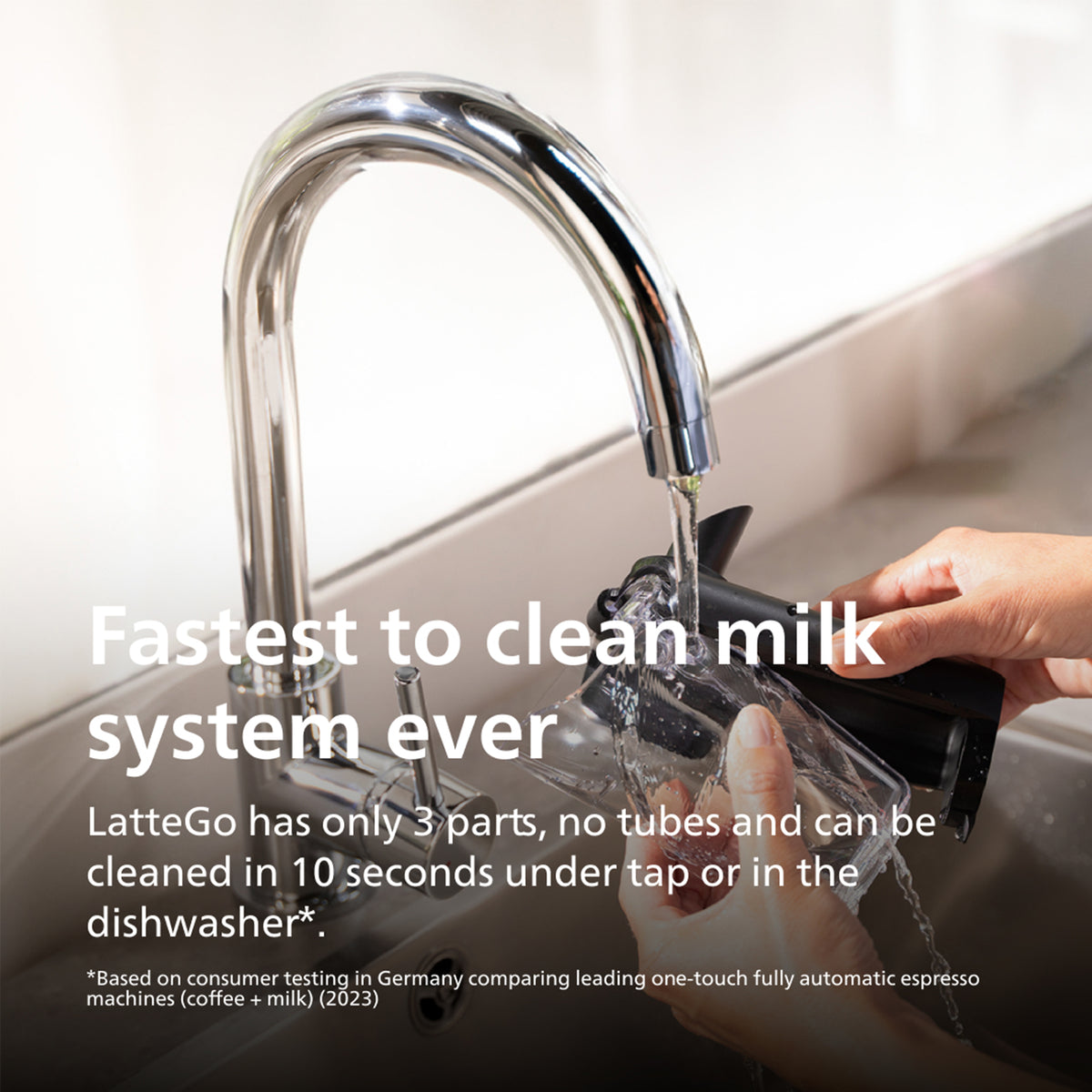 LatteGo milk system being cleaned under a faucet with text about its cleaning efficiency.