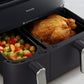 Philips 5000 Series Dual-Basket Airfryer with Steam, cooking chicken and vegetables. 