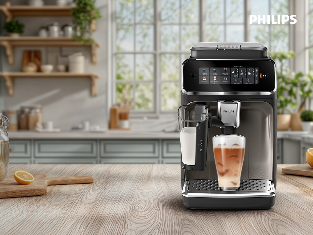 Philips coffee machine on a kitchen counter with a glass of coffee.