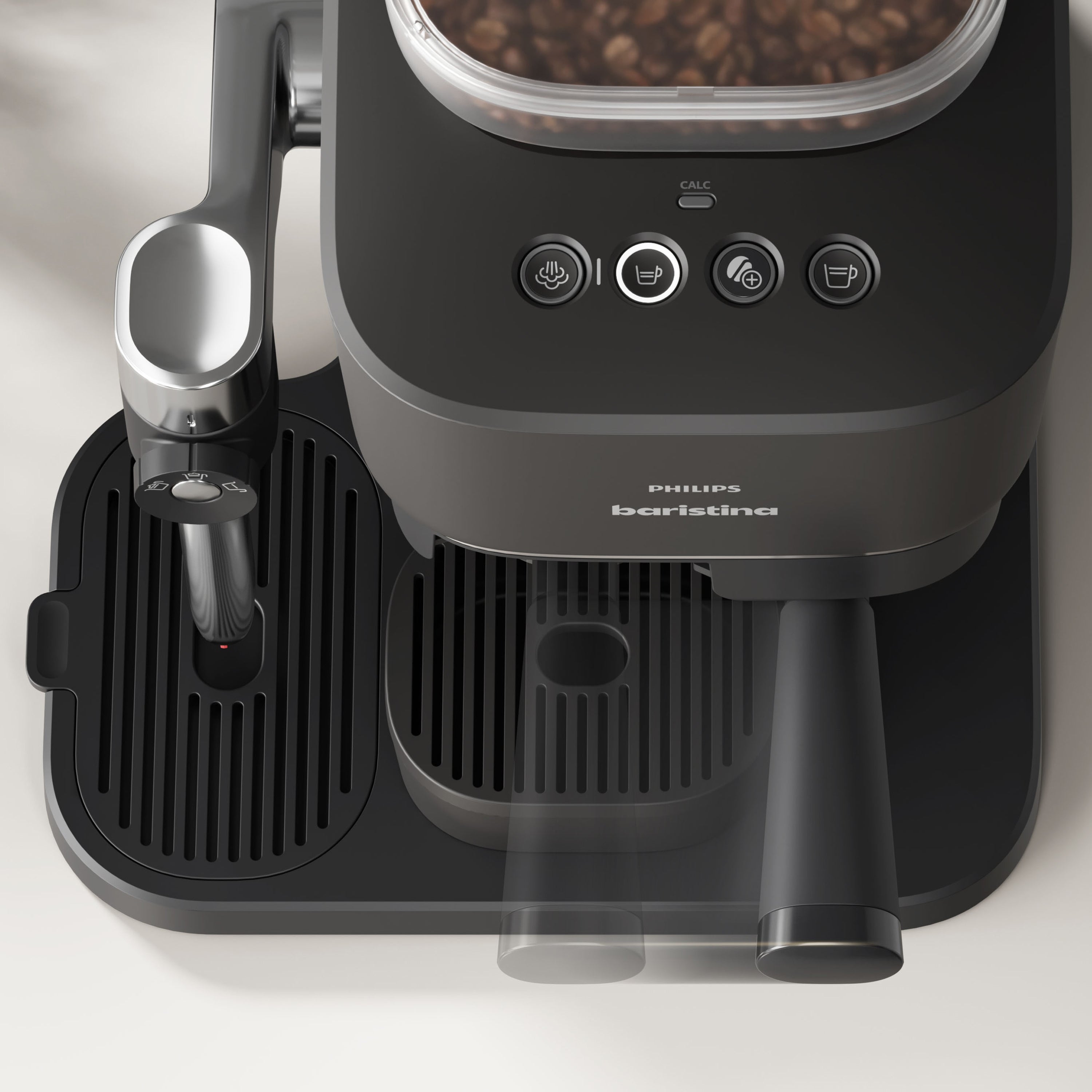 Black Philips Baristina coffee machine on a light background