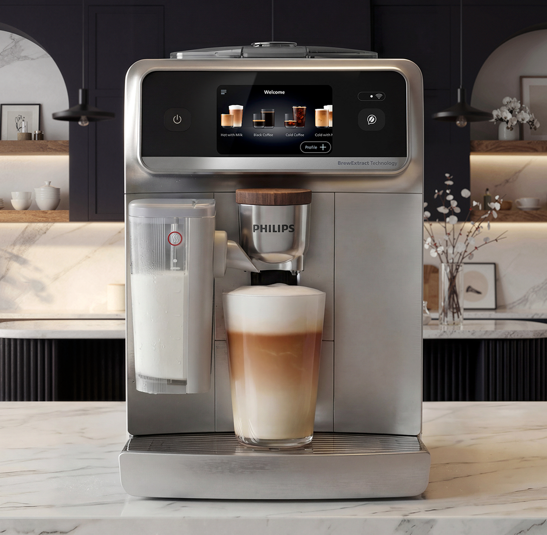 Philips coffee machine dispensing a layered drink on a kitchen counter.