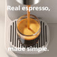 Espresso being poured into a glass with text 'Real espresso, made simple.'